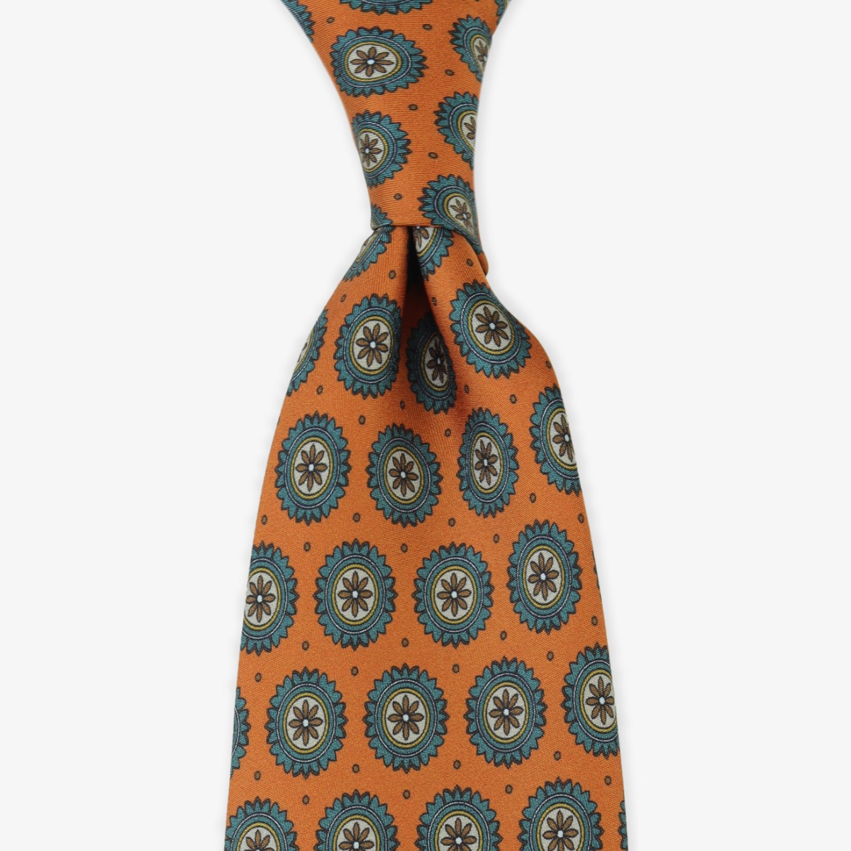 Serà Fine Silk orange silk tie with teal medallion pattern