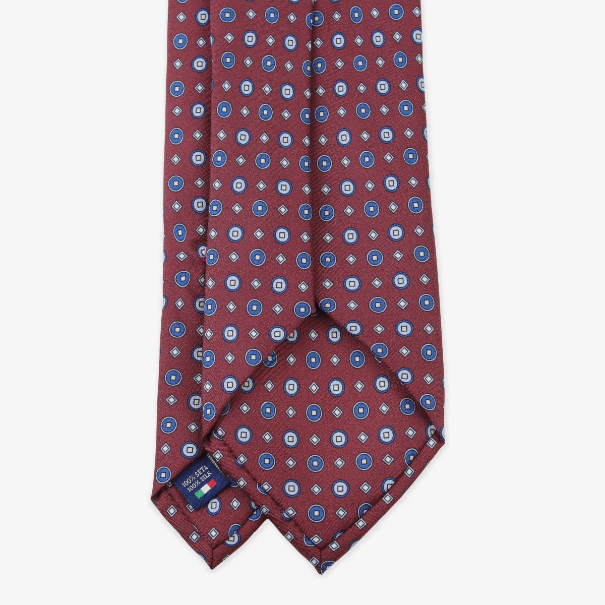Serà Fine Silk burgundy silk tie with blue circle pattern