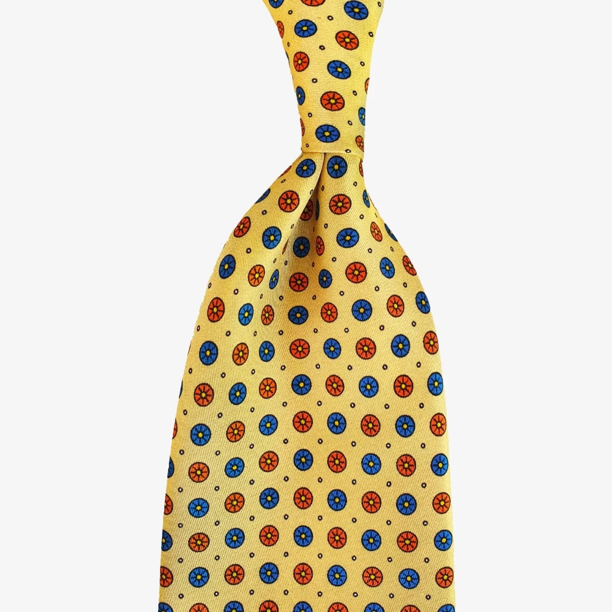 Serà Fine Silk geltonas šilkinis kaklaraištis su mėlynų gėlių raštu