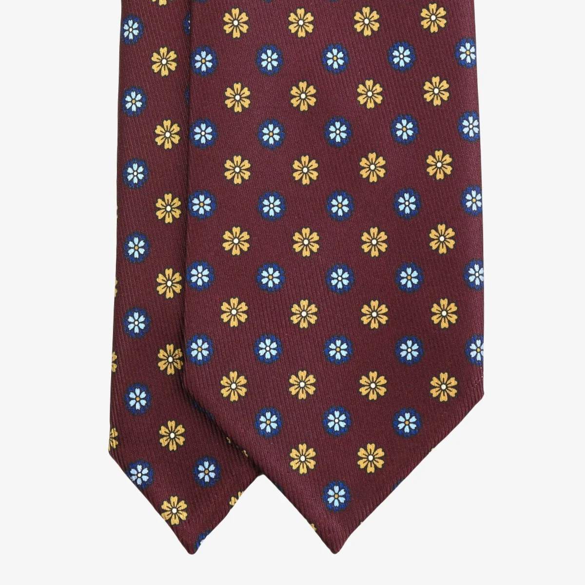 Shibumi Firenze 7 lenkimų tamsiai raudonas šilkinis kaklaraištis su mėlynų ir geltonų gėlių raštu