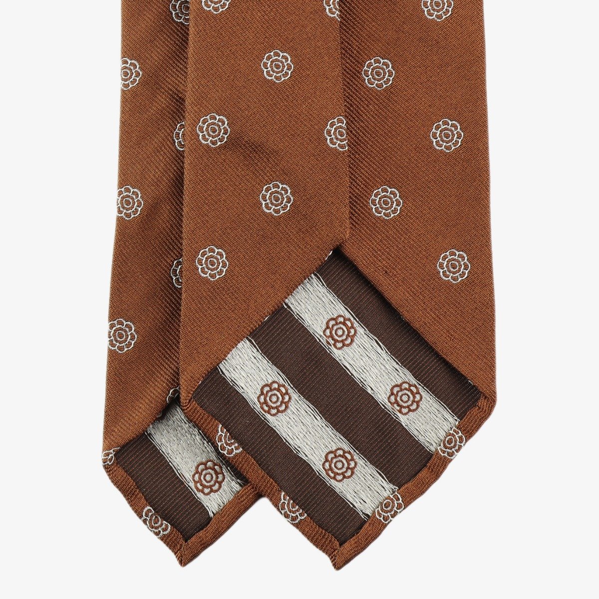 Shibumi Firenze copper silk tie with white floral pattern