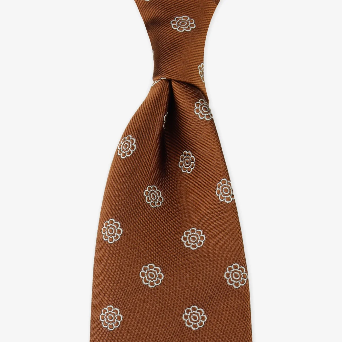 Shibumi Firenze copper Japanese jacquard repp silk tie with white floral pattern