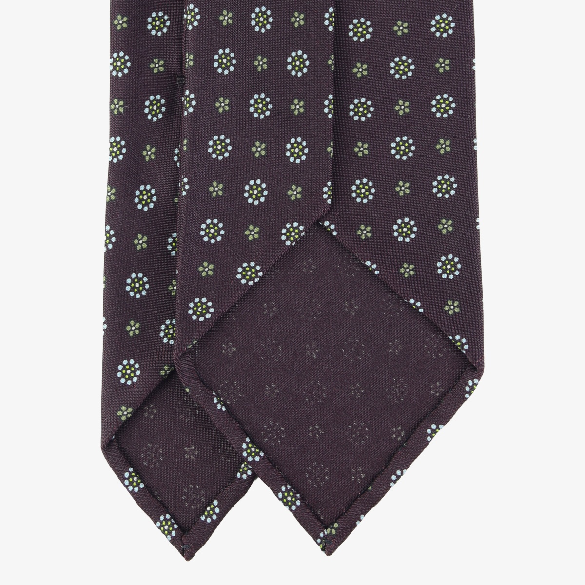 Shibumi Firenze eggplant silk tie with light blue floral pattern