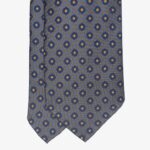 Shibumi Firenze pilkas šilkinis kaklaraištis su mėlynų gėlių raštu