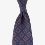 Shibumi Firenze navy ancient madder silk tie with orange and blue square pattern