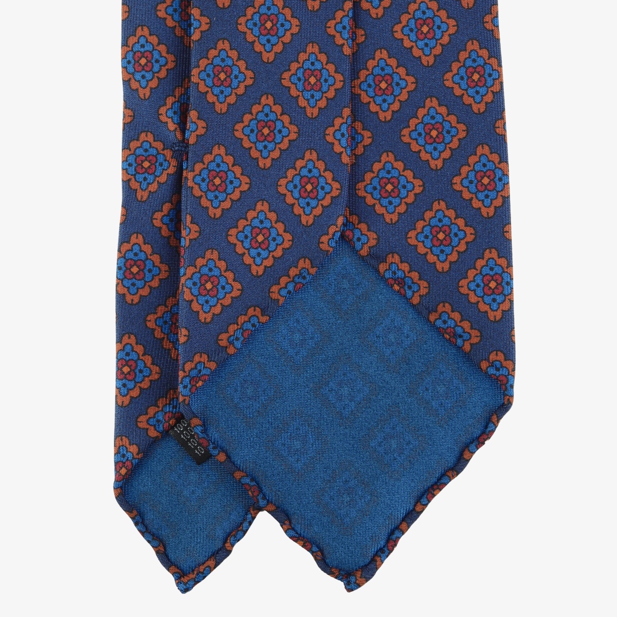 Shibumi Firenze navy ancient madder silk tie with orange and blue square pattern