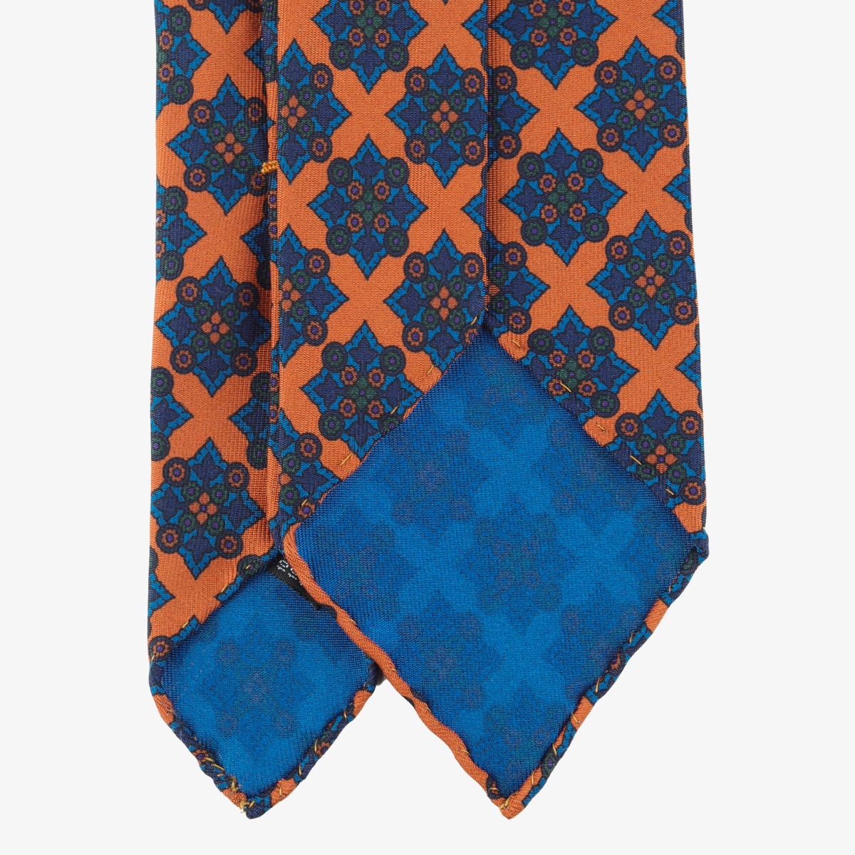 Shibumi Firenze orange Ancient Madder silk tie with blue medallion pattern