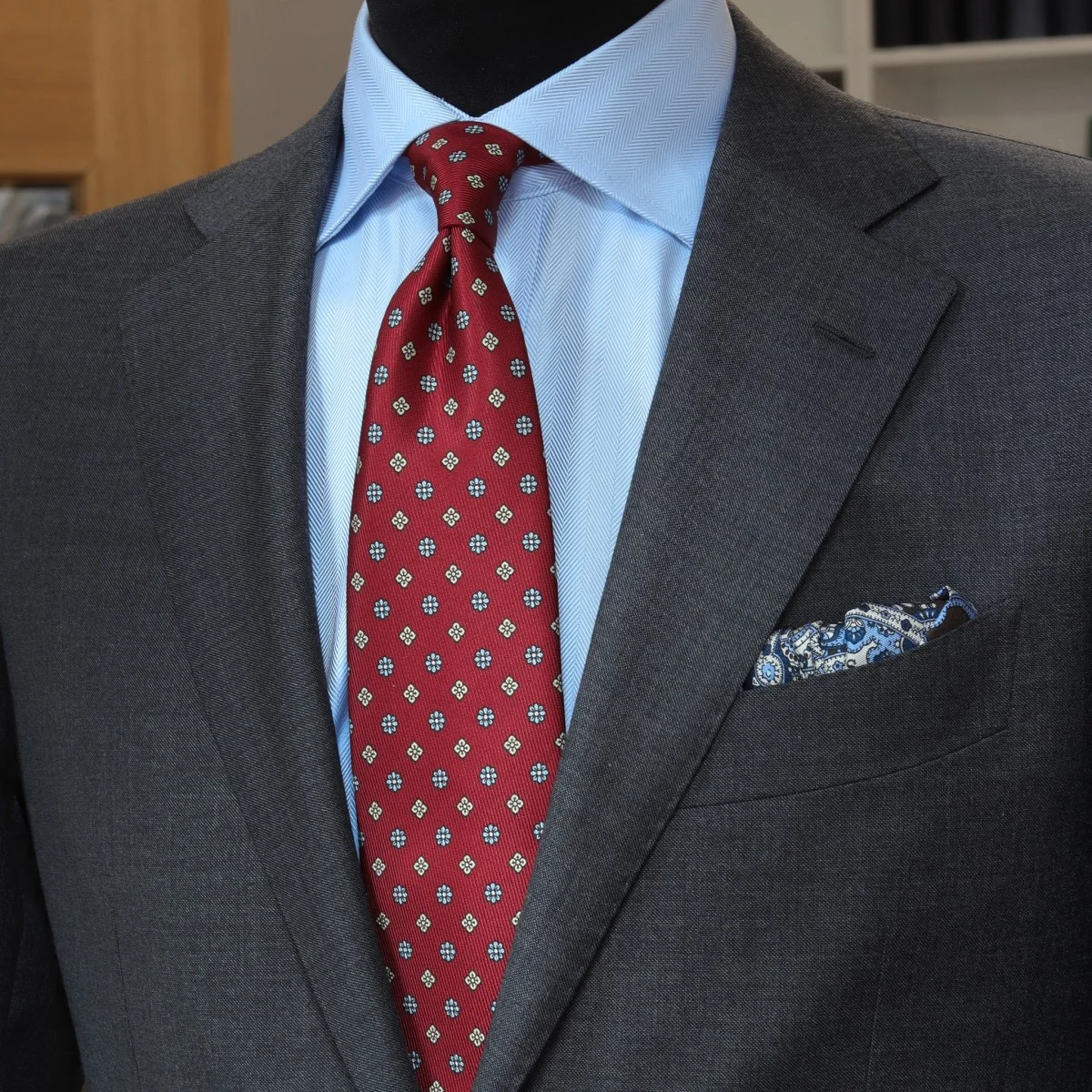 Charcoal grey suit light blue shirt red patterned grenadine tie combination